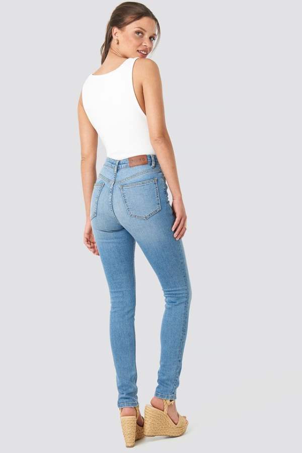 Women Mid-Rise Clean Look Stretchable Cropped Jeans  - Side View - AceCart